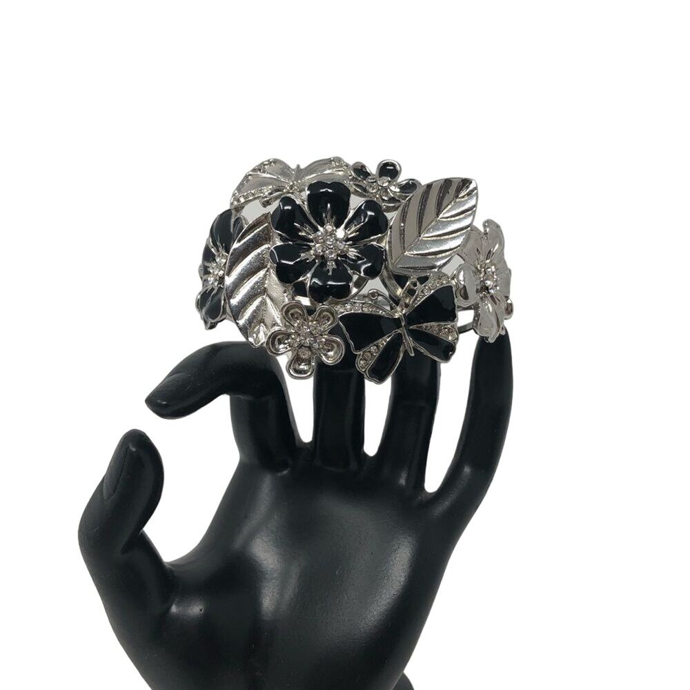 Silver Bracelet with Black enamel flowers/bows